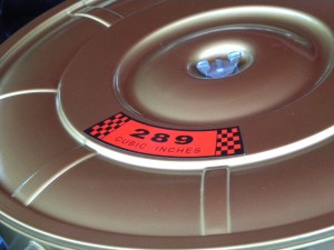 Both the Mustangs have identical running gear.  This engine badge on the air cleaner identifies itself as a 289 cubic-inch V8 (4.6 Liters).  