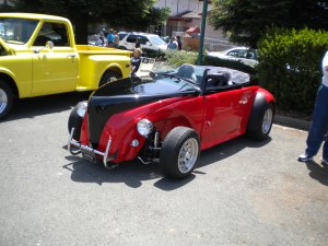 I like the paint scheme.  Also, I think that the wheels could be a bit taller.  it makes the car look oddly proportioned.  