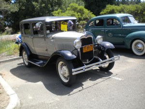 It's a rare two-door model.  Two-door Fords from the 1930's always command a large premium over the four-doors for some inexplicable reason.  However, they are a dime a dozen.  